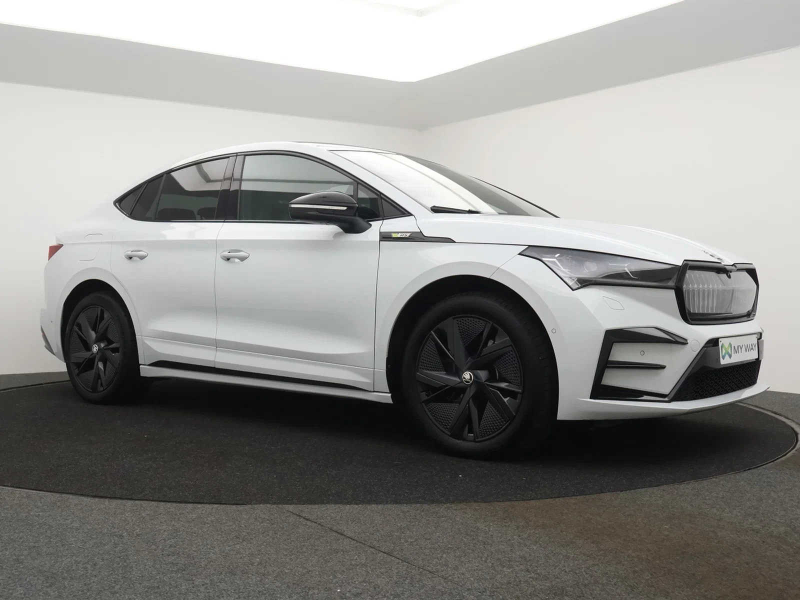 Škoda Enyaq Coupe RS Enyaq Coupe iV vRS 82kWh 299PK 4x4 *AUTOMAAT*SPORTZETELS*LEDER*PANODAK*CAMERA*PDC*CRUISE*KEYLESS*...